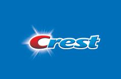 Crest toothpaste corporate logo on blue background