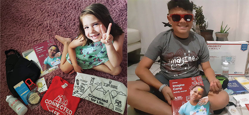 Smiling young girl and young boy with Imagine Camp merchandise