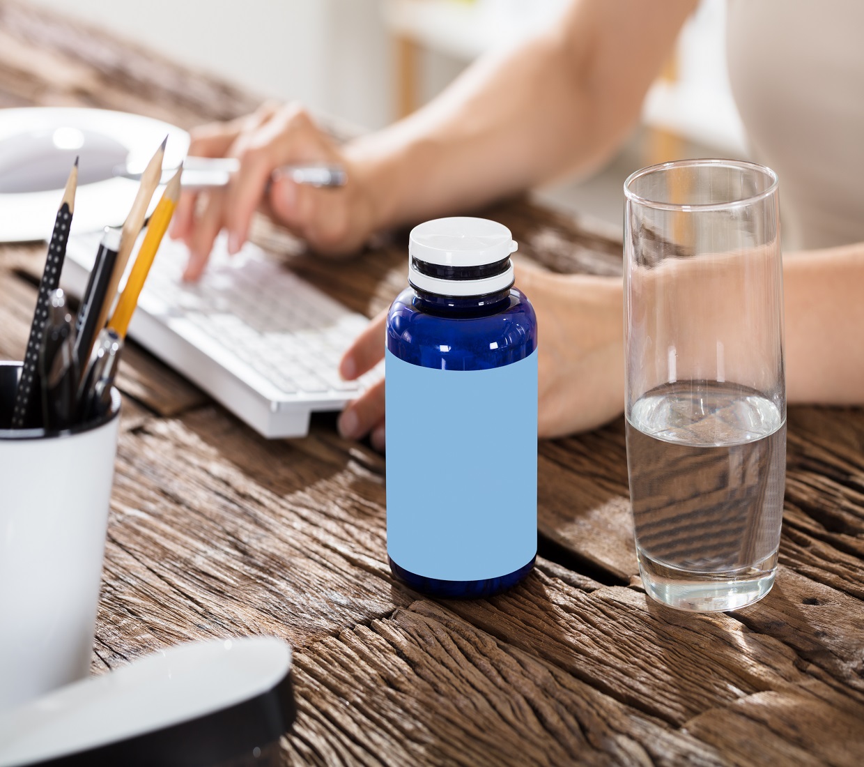 Pill Bottle with a glass of water